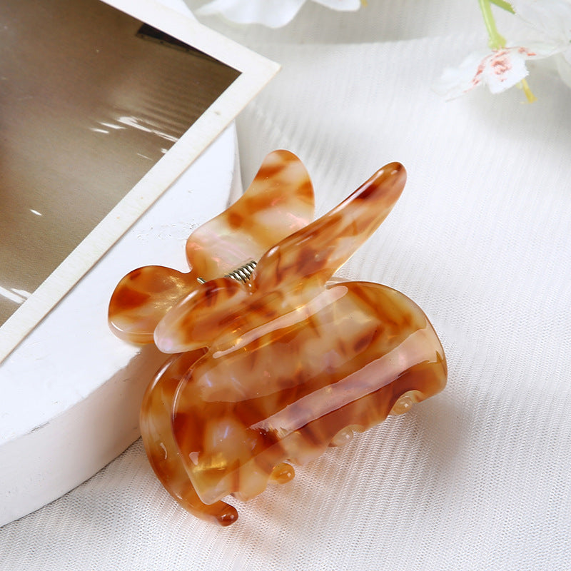 Butterfly marbled claw Clip