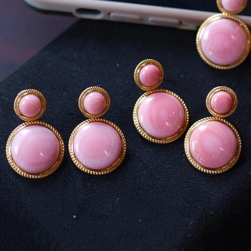 Inlaid pink enamel round earrings