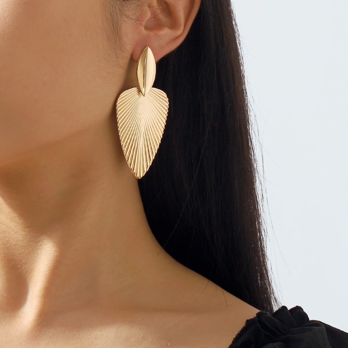 Metallic cattail leaf earrings