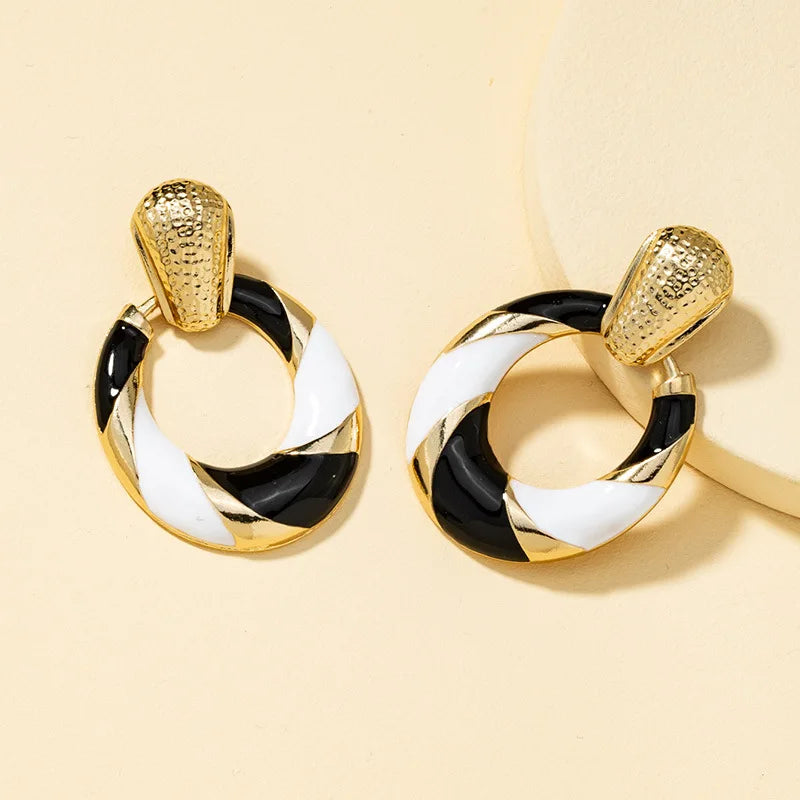 TMI oil drip earrings