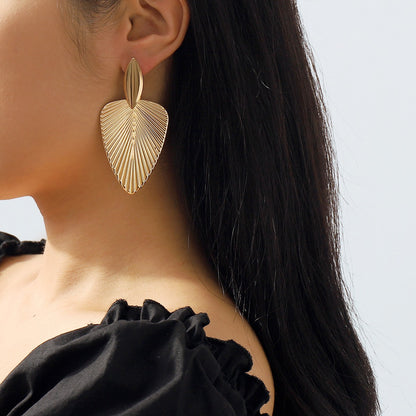 Metallic cattail leaf earrings