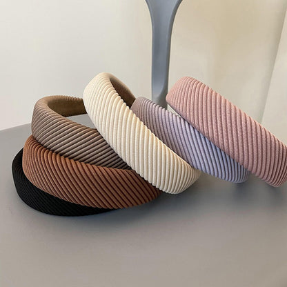 Diagonal striped wide-brimmed headband