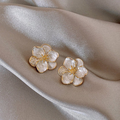 White flower fairy earrings