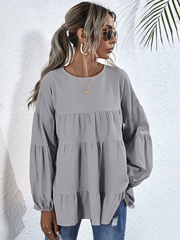 Shiny Round Neck Dropped Shoulder Tiered Blouse